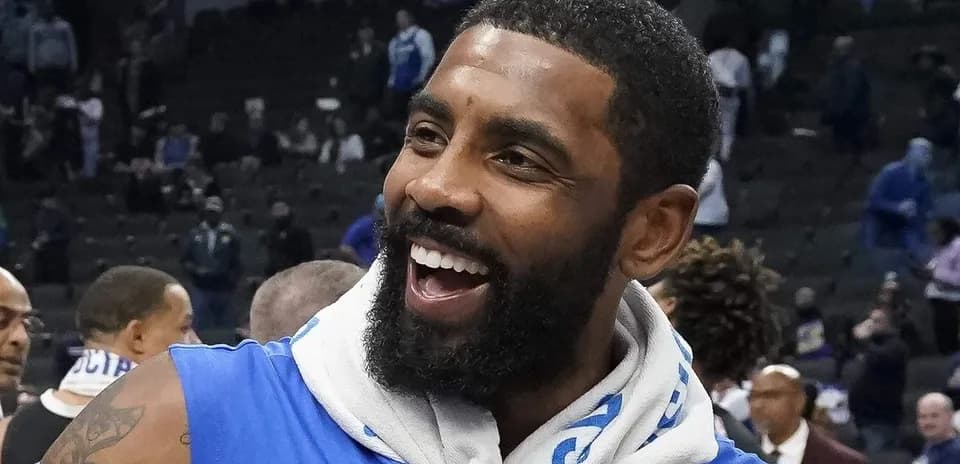 Player celebrating after a game in blue jersey
