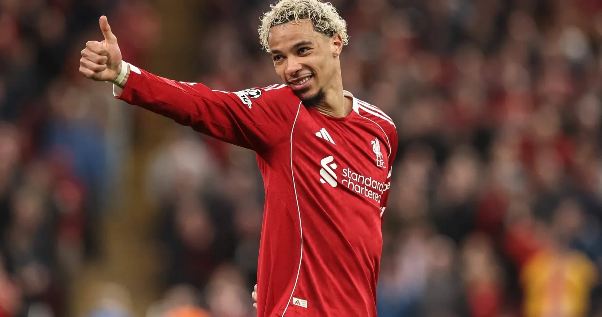 Player celebrating with a thumbs up gesture