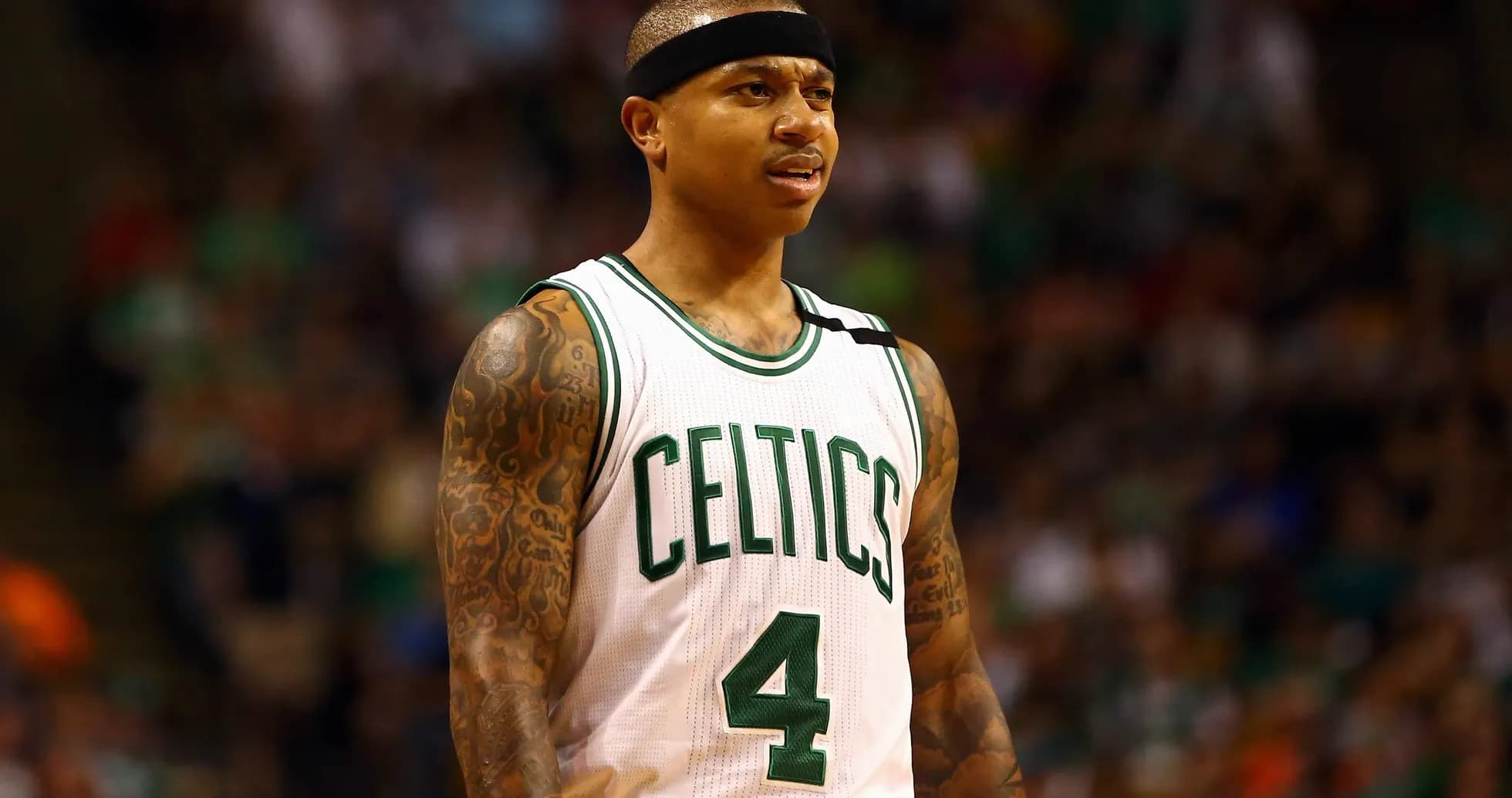 Player in Celtics jersey on basketball court