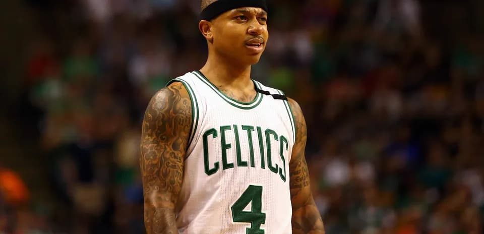 Player in Celtics jersey on basketball court