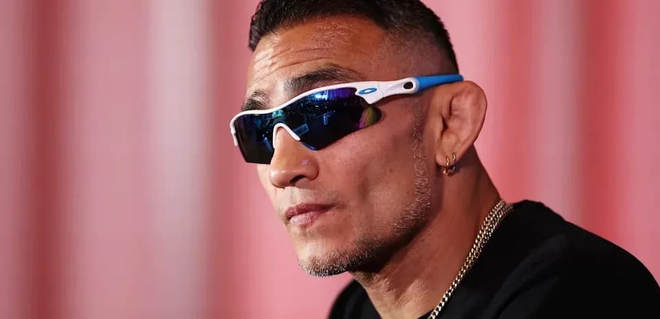 Fighter wearing sunglasses during press conference