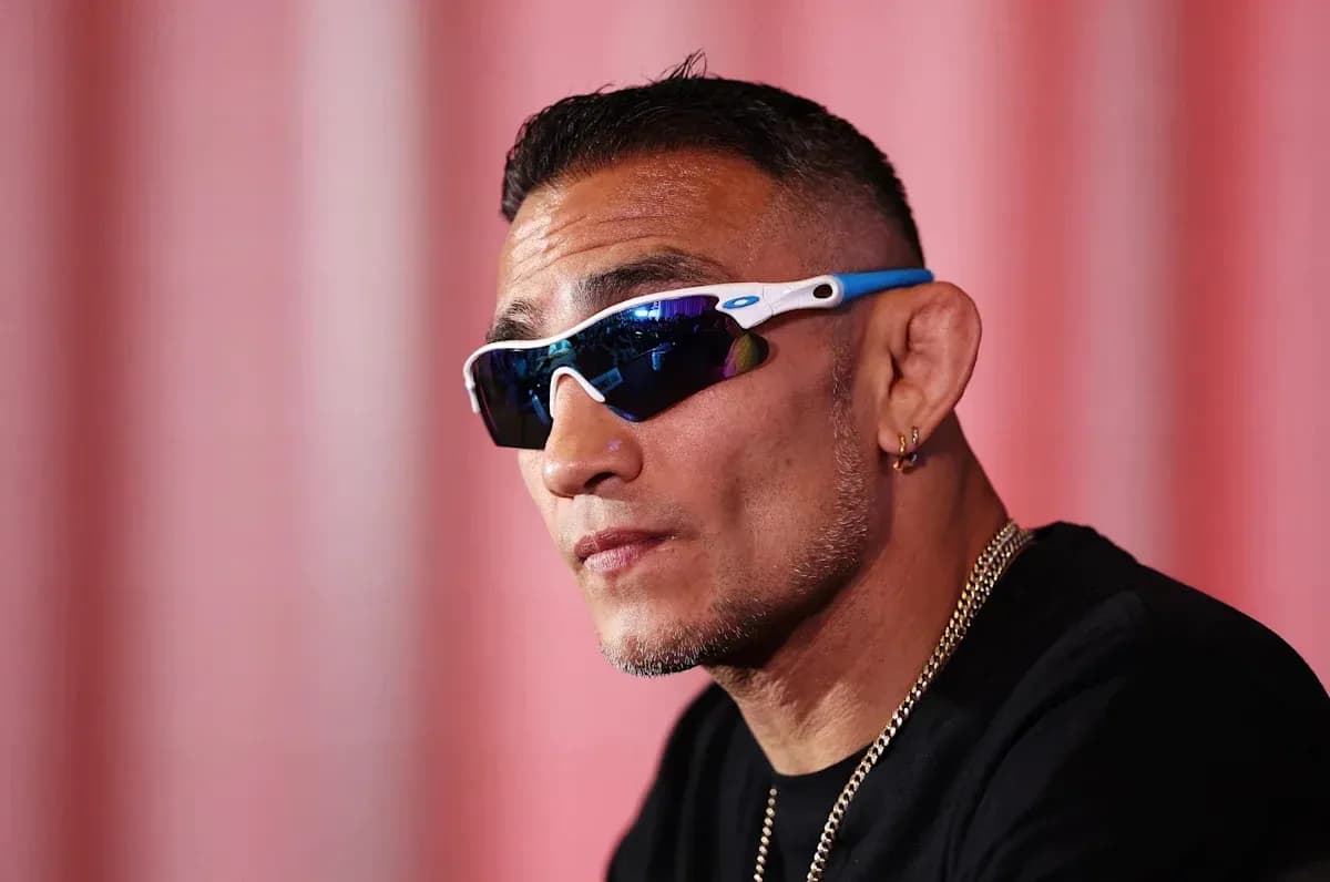 Fighter wearing sunglasses during press conference
