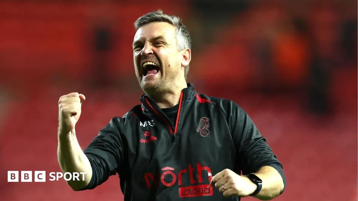 Coach celebrating enthusiastically after a match