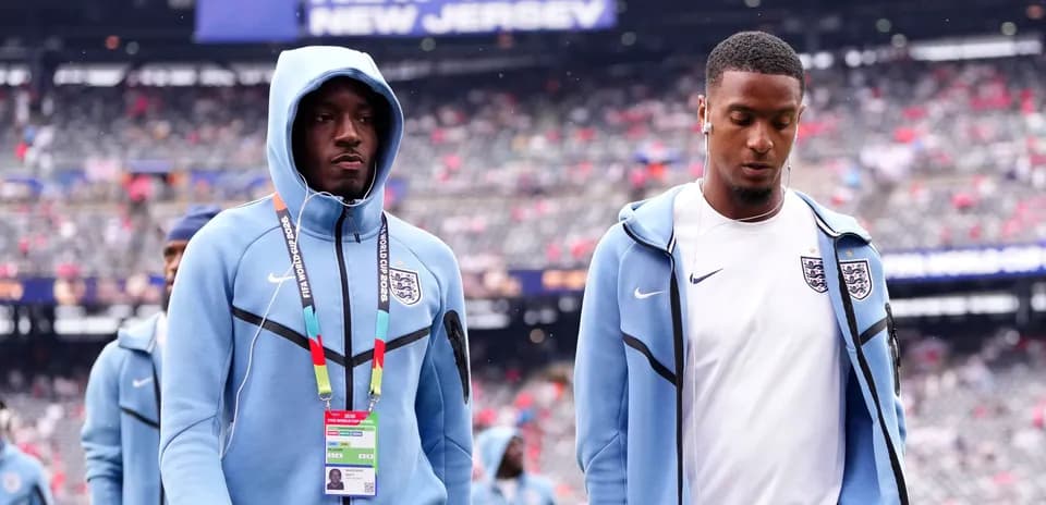 England players walking on the field before match