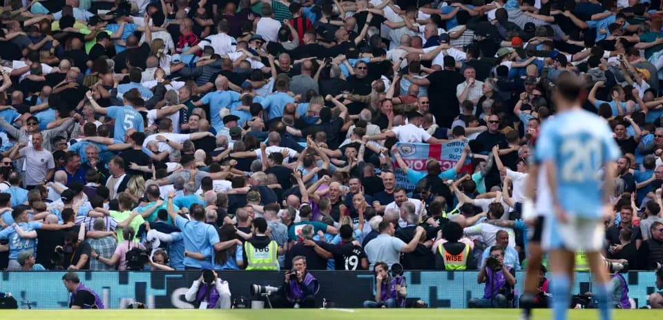 Why Manchester City Fans Bring Inflatable Bananas to Anfield