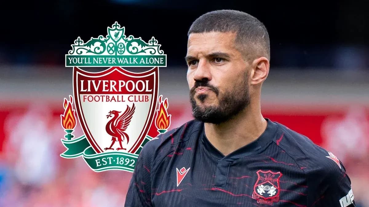 Player in Liverpool kit with club logo in background Player in Liverpool kit with club logo in background