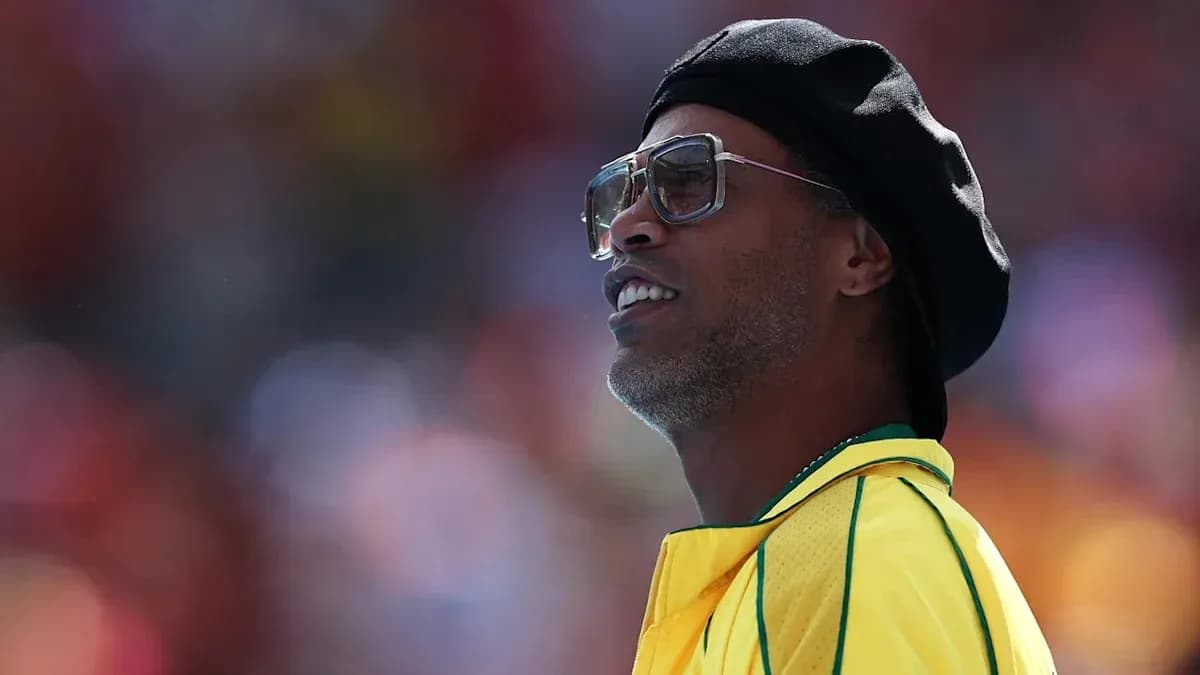 Man wearing sunglasses and yellow jersey at event Man wearing sunglasses and yellow jersey at event