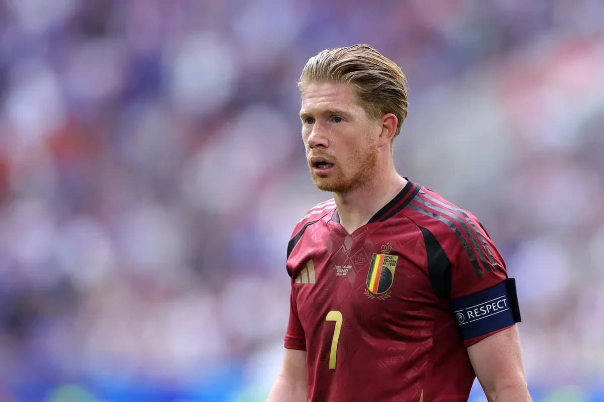 Belgian player wearing red jersey on the field Belgian player wearing red jersey on the field