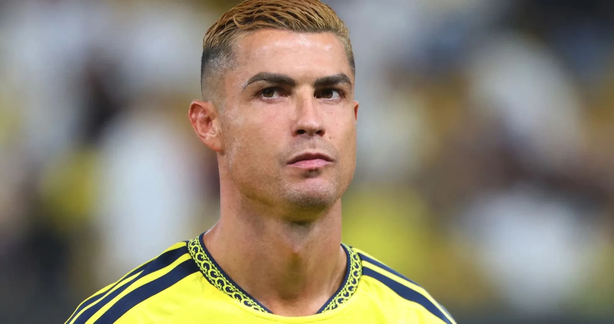 Cristiano Ronaldo in yellow jersey during match Cristiano Ronaldo in yellow jersey during match