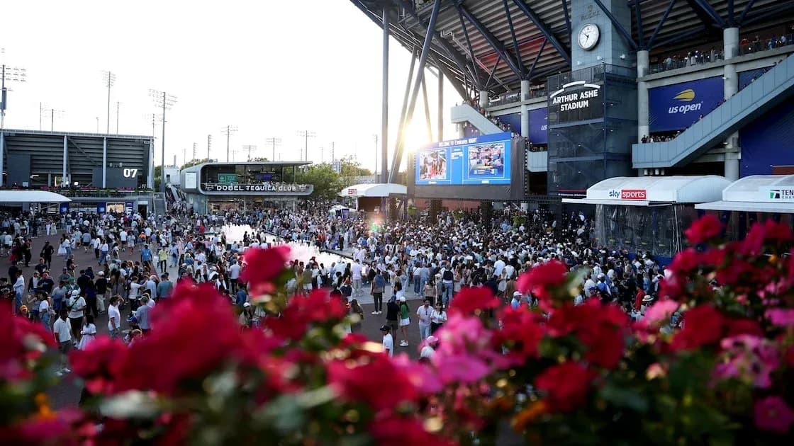 Crowd gathering outside Arthur Ashe Stadium during event Crowd gathering outside Arthur Ashe Stadium during event