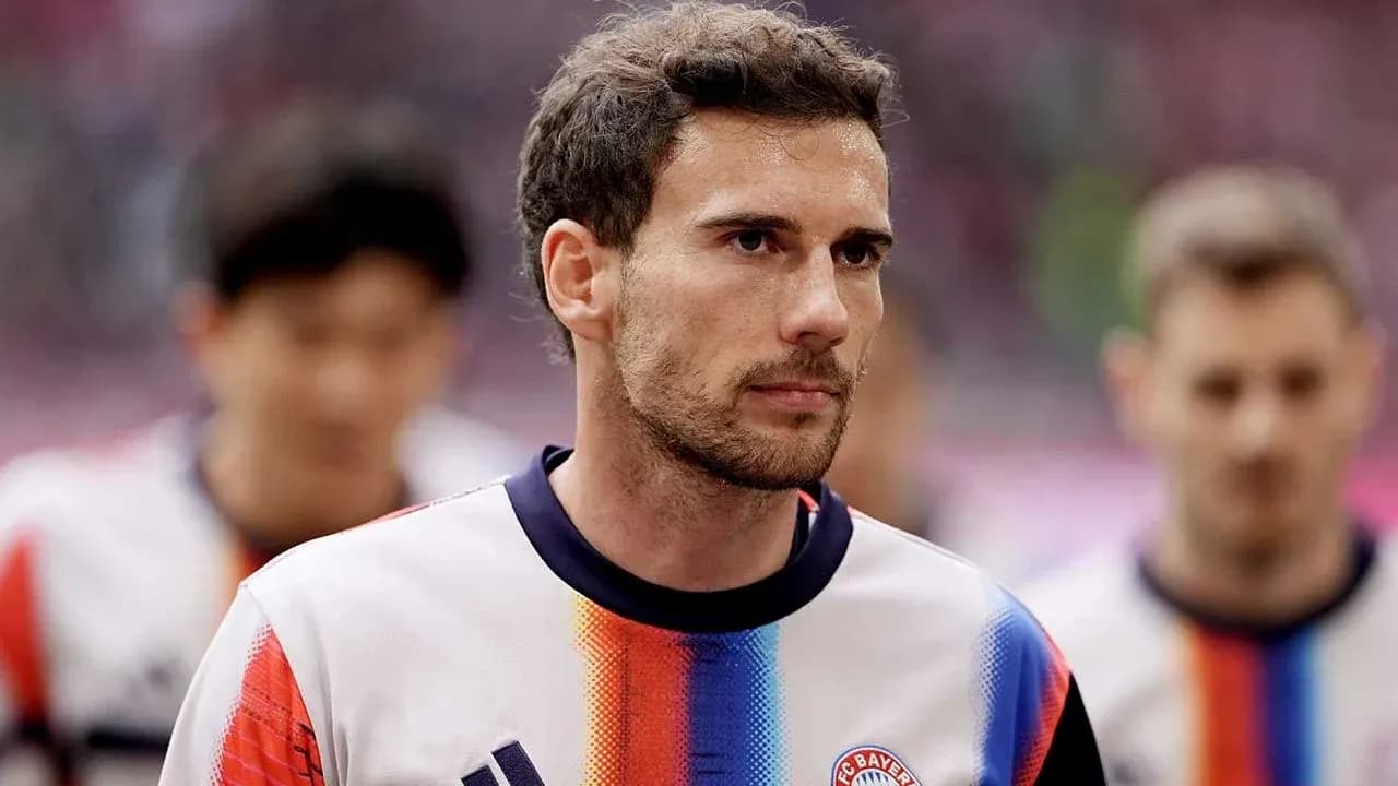Player in Bayern Munich kit walking onto the field Player in Bayern Munich kit walking onto the field