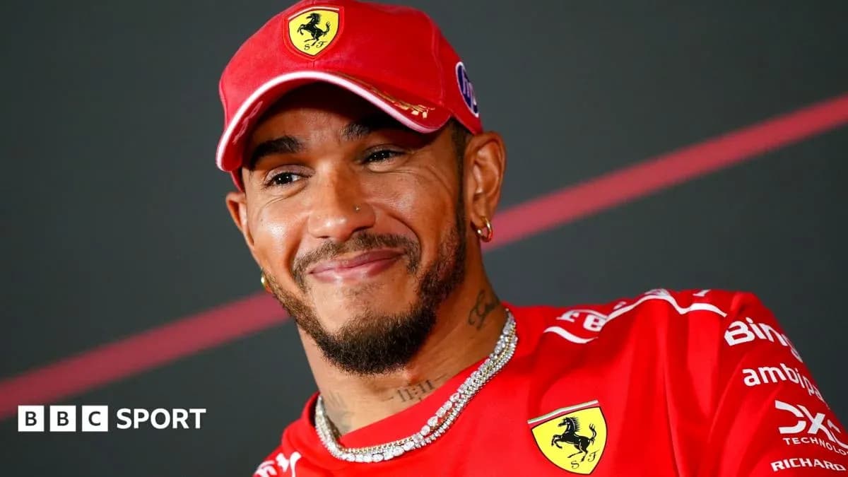 Driver in red Ferrari cap at press conference Driver in red Ferrari cap at press conference