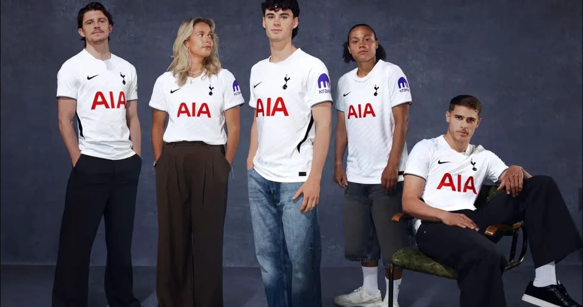 Five individuals wearing Tottenham Hotspur jerseys posing together Five individuals wearing Tottenham Hotspur jerseys posing together