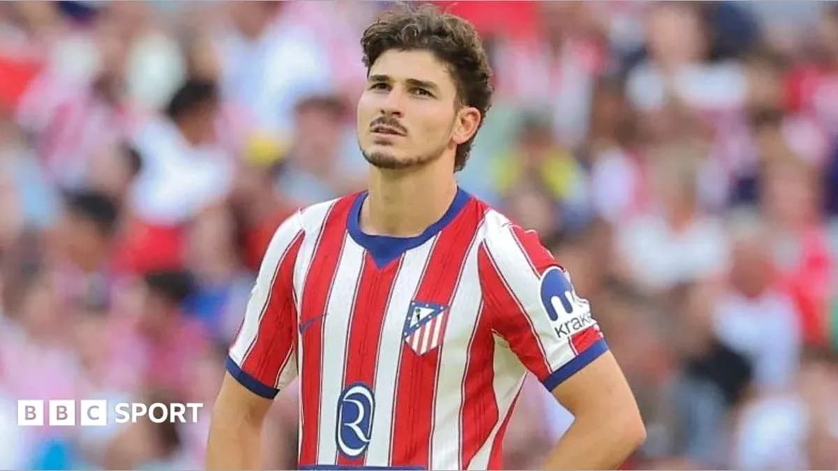 Player in Atlético Madrid jersey during match Player in Atlético Madrid jersey during match