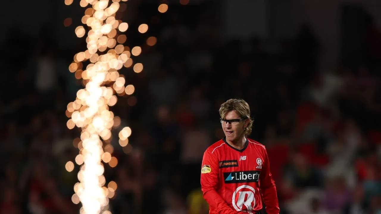 Player in red uniform during match with fireworks Player in red uniform during match with fireworks