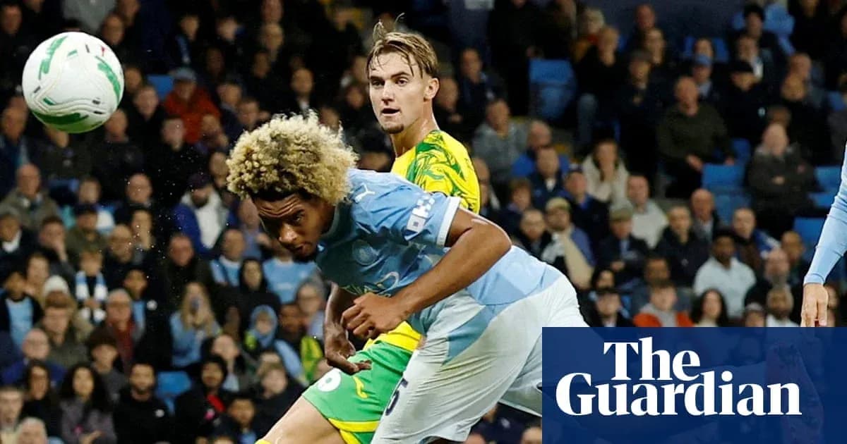 Player heading the ball during a match action Player heading the ball during a match action