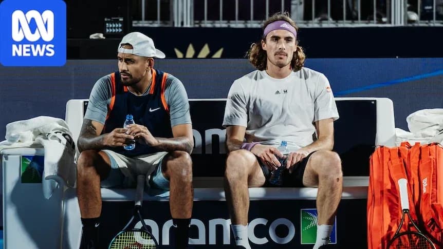 Two tennis players sitting on bench during match Two tennis players sitting on bench during match