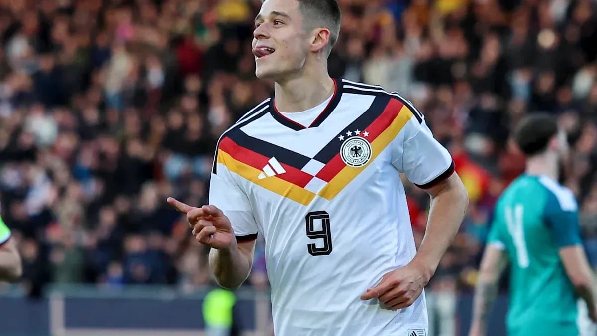 German player celebrating after scoring a goal German player celebrating after scoring a goal