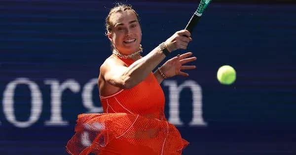 Player hitting a forehand shot in bright outfit Player hitting a forehand shot in bright outfit
