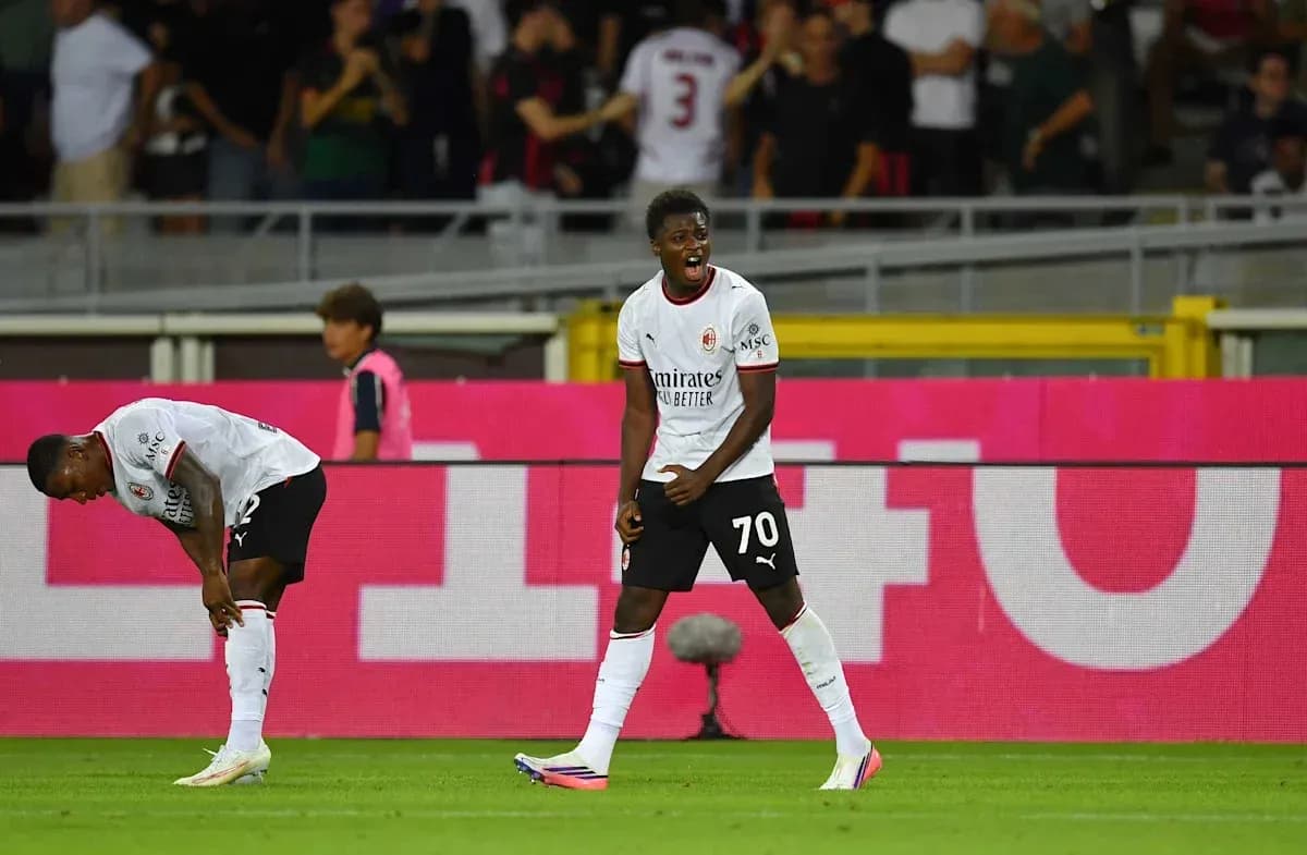 AC Milan player celebrating during a match AC Milan player celebrating during a match