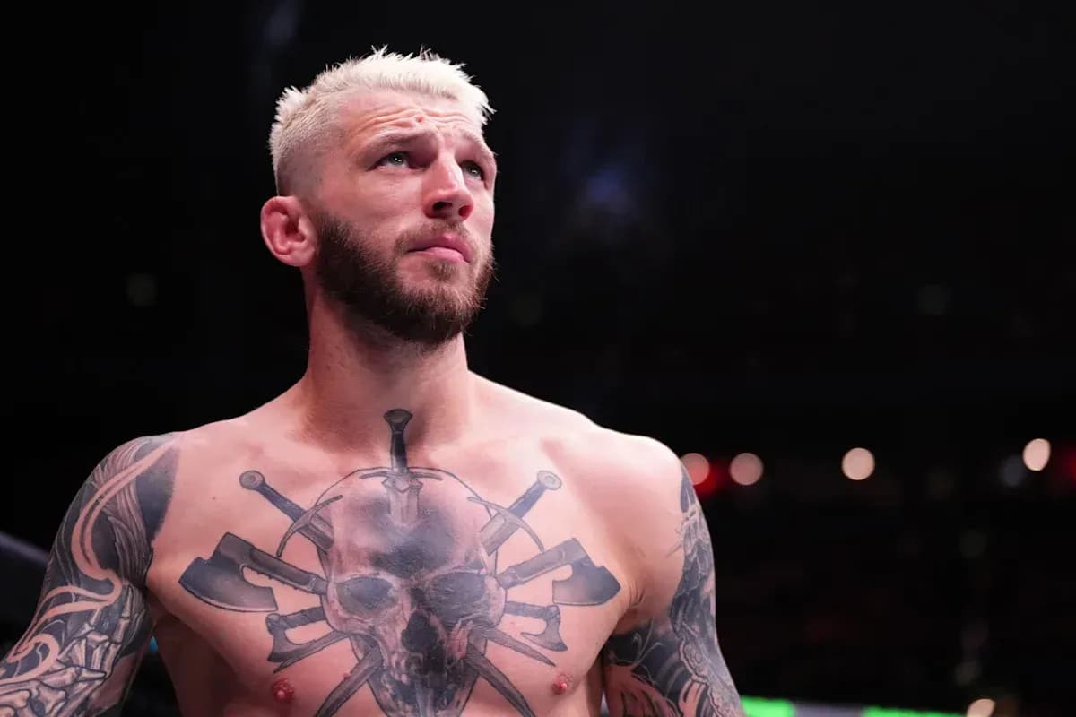 Fighter with tattoos preparing for match Fighter with tattoos preparing for match