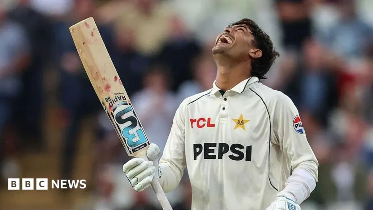 Cricketer celebrating with bat after scoring Cricketer celebrating with bat after scoring