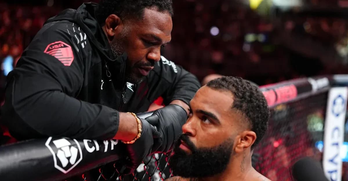 Coach giving advice to fighter in the corner Coach giving advice to fighter in the corner