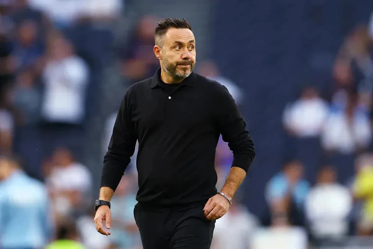 Coach walking on the sidelines during match Coach walking on the sidelines during match