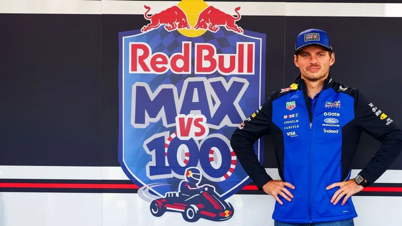 Driver posing in front of Red Bull promotional banner Driver posing in front of Red Bull promotional banner