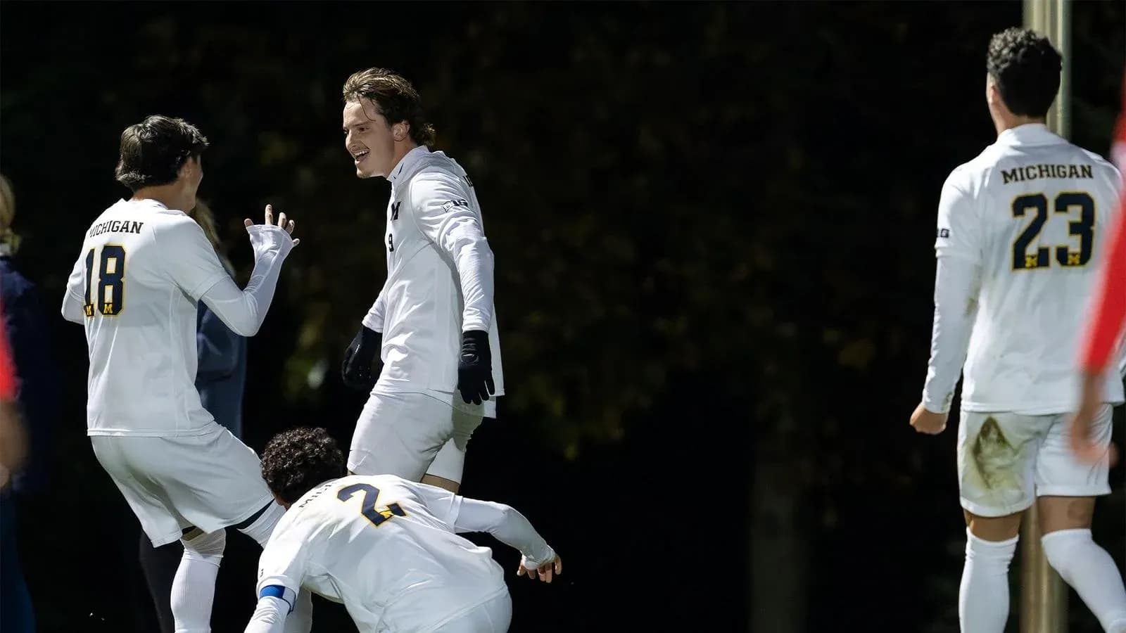 Michigan players celebrating a goal during match Michigan players celebrating a goal during match