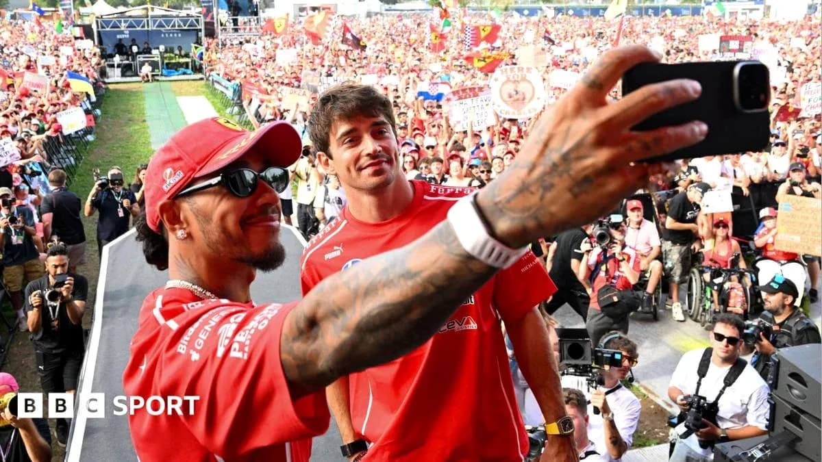 Drivers taking selfie with crowd at event Drivers taking selfie with crowd at event