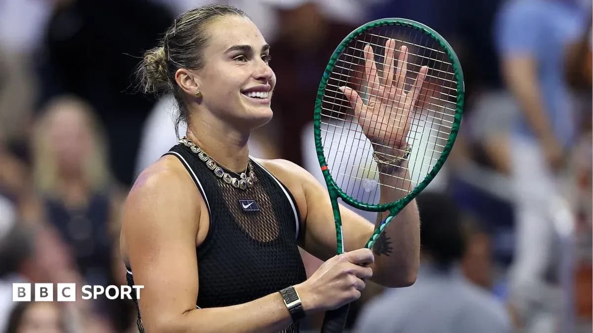 Tennis player waving with racket at audience Tennis player waving with racket at audience