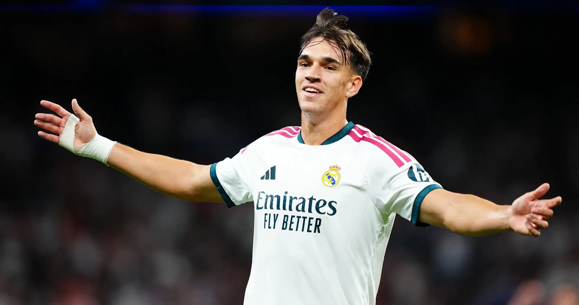Player celebrating after scoring during a match Player celebrating after scoring during a match