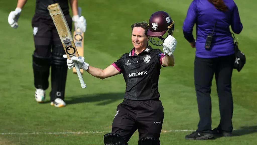 Batter celebrating after scoring a century on field Batter celebrating after scoring a century on field