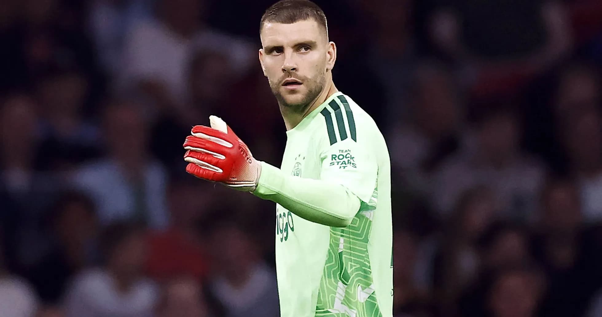 Goalkeeper gesturing during a football match Goalkeeper gesturing during a football match