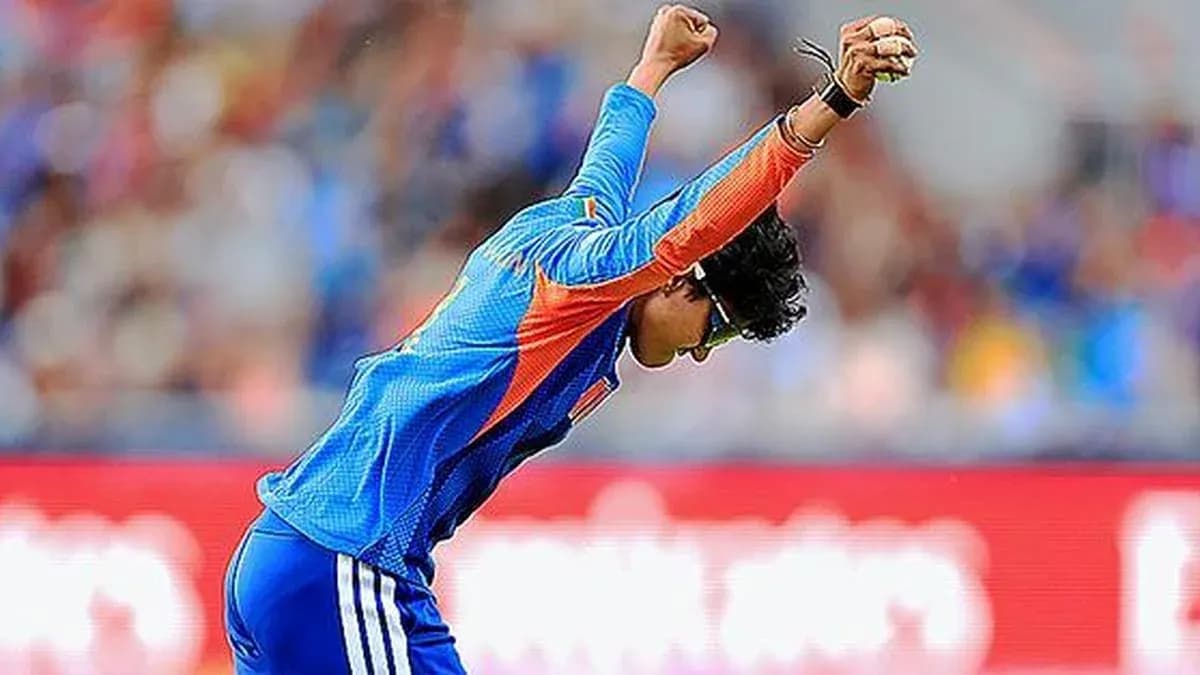 Cricketer celebrating a wicket on the field Cricketer celebrating a wicket on the field