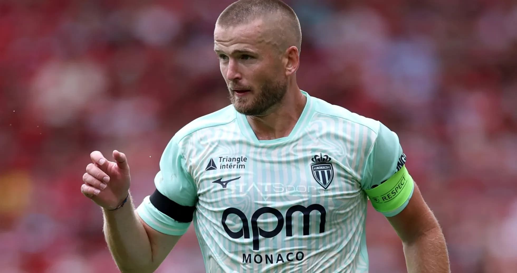 Player in Monaco kit during match action Player in Monaco kit during match action