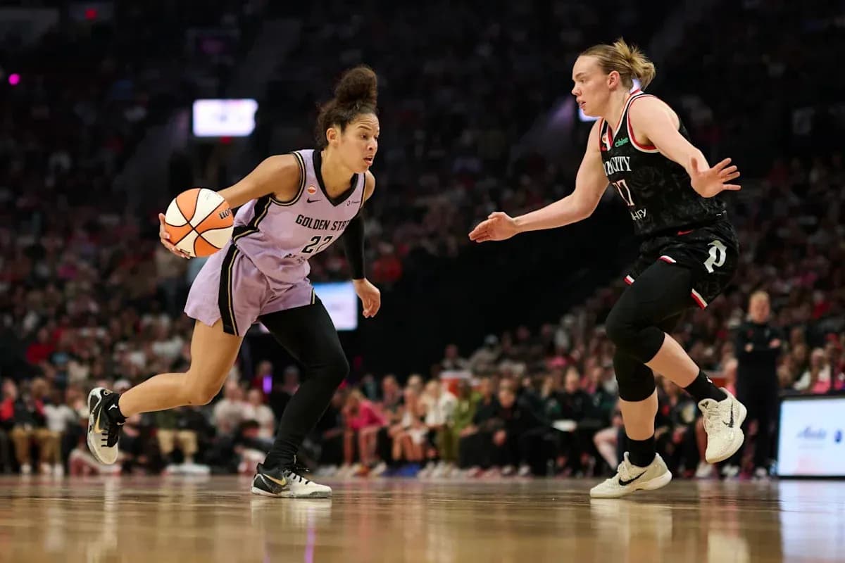 Player dribbling ball during basketball game action Player dribbling ball during basketball game action
