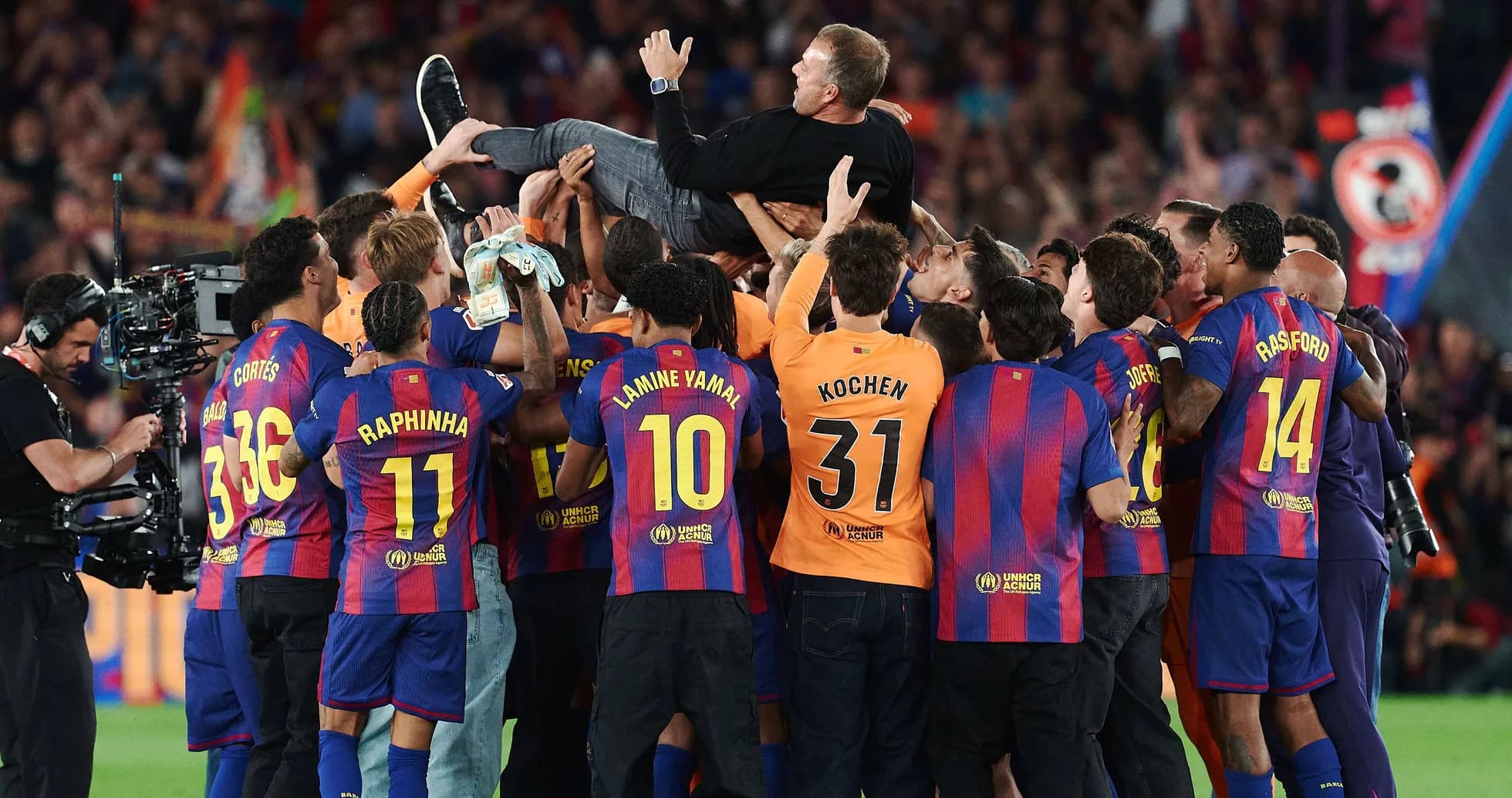Barcelona players celebrating with their coach after victory Barcelona players celebrating with their coach after victory