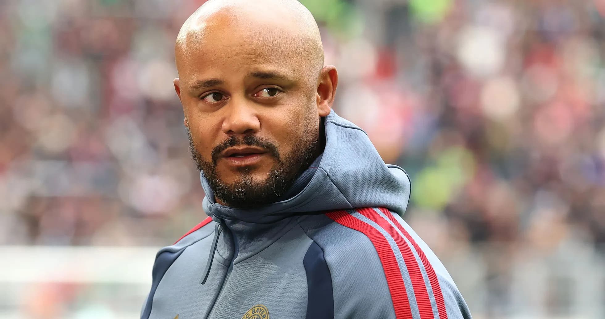 Coach wearing Bayern Munich tracksuit on the sideline Coach wearing Bayern Munich tracksuit on the sideline
