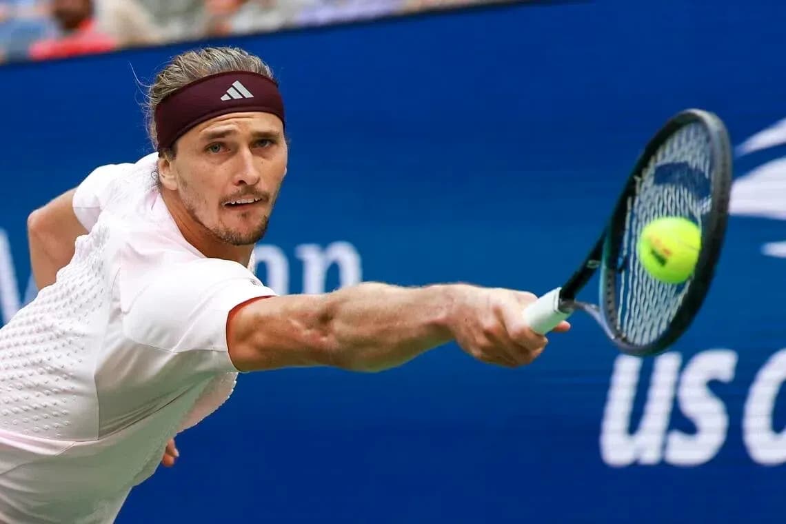 Player hitting a forehand during tennis match Player hitting a forehand during tennis match