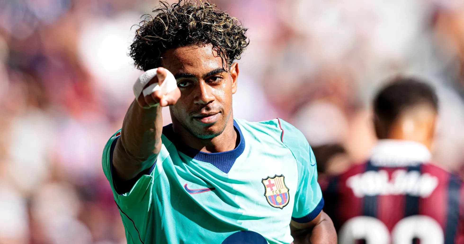 Player celebrating and pointing after scoring goal Player celebrating and pointing after scoring goal