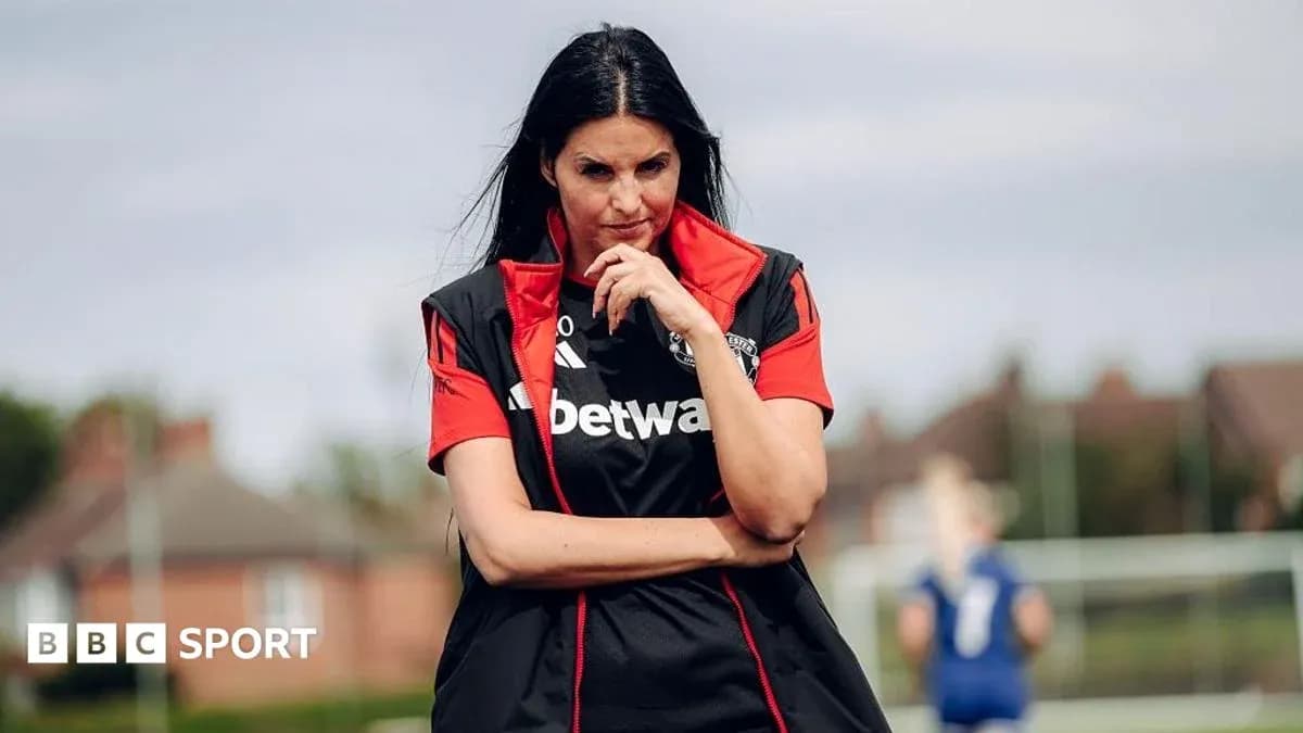 Coach observing players during training session Coach observing players during training session