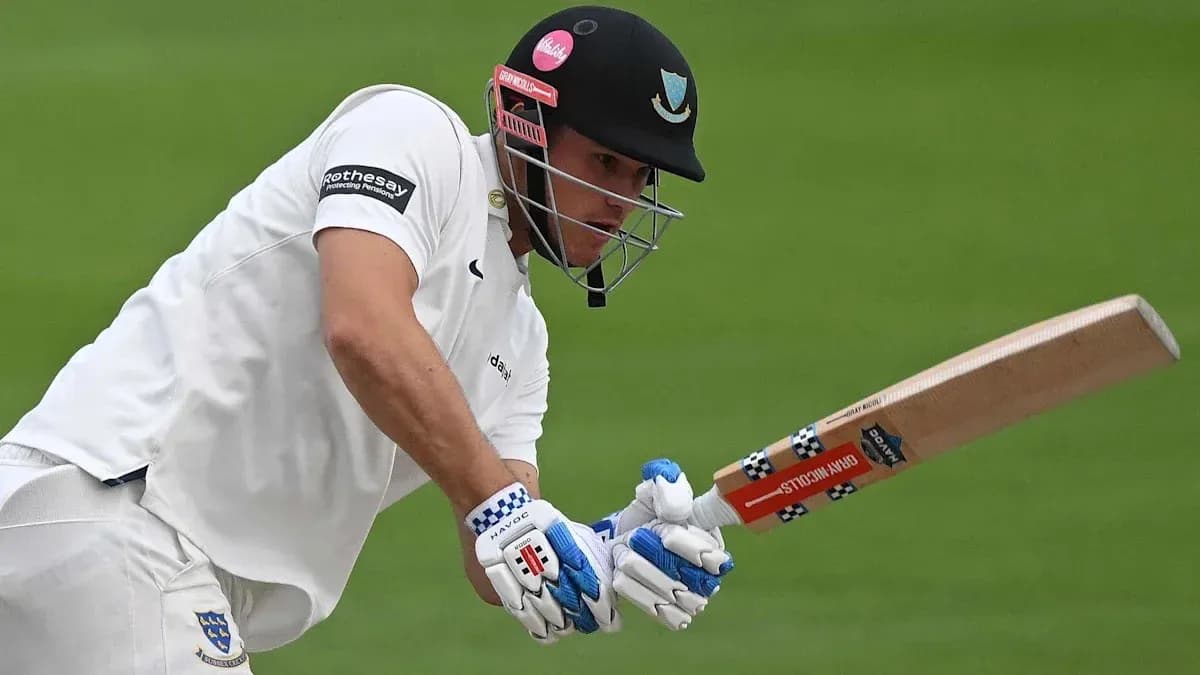 Batsman playing a shot during a cricket match Batsman playing a shot during a cricket match