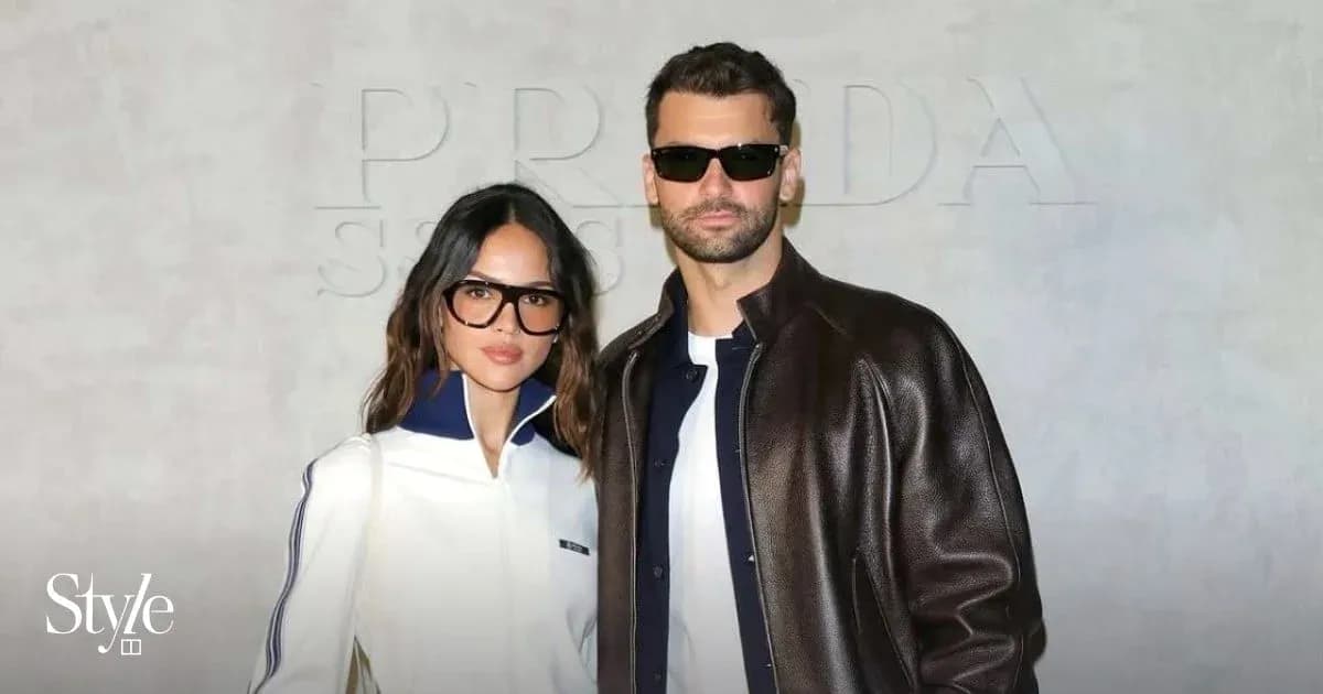 Couple posing together at fashion event Couple posing together at fashion event