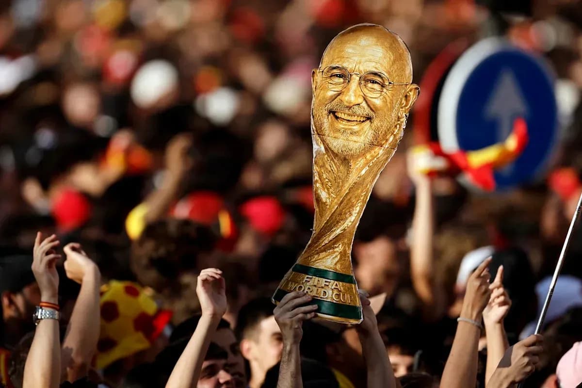 Fans celebrating with FIFA World Cup trophy outdoors Fans celebrating with FIFA World Cup trophy outdoors