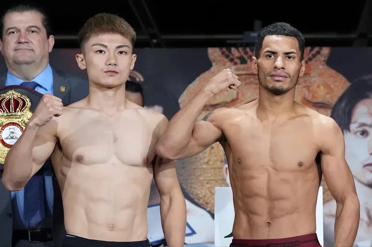 Two boxers posing during weigh-in event Two boxers posing during weigh-in event