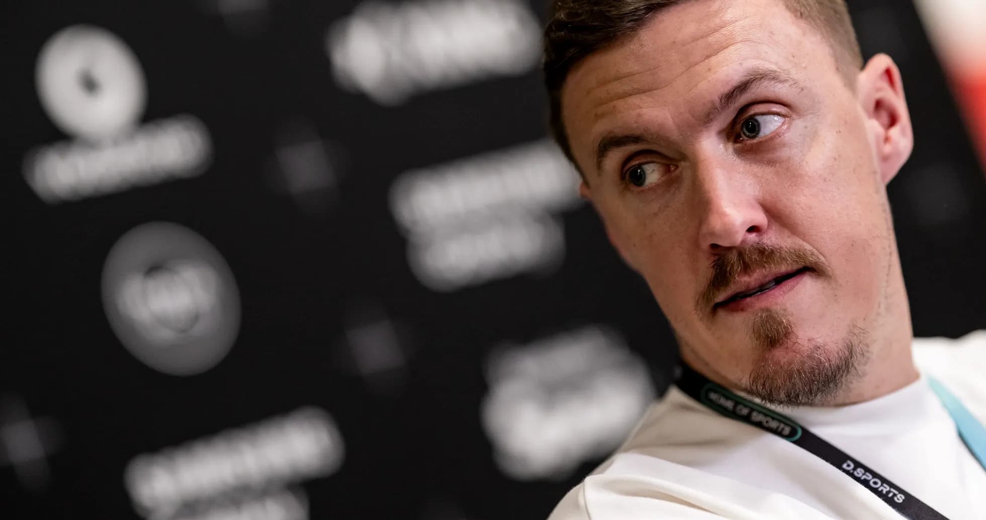 Athlete speaking during a press conference event Athlete speaking during a press conference event