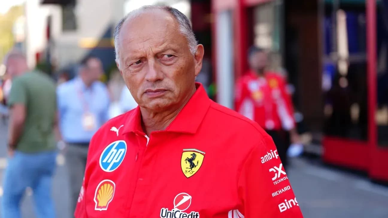 Team principal in Ferrari uniform at racing event Team principal in Ferrari uniform at racing event