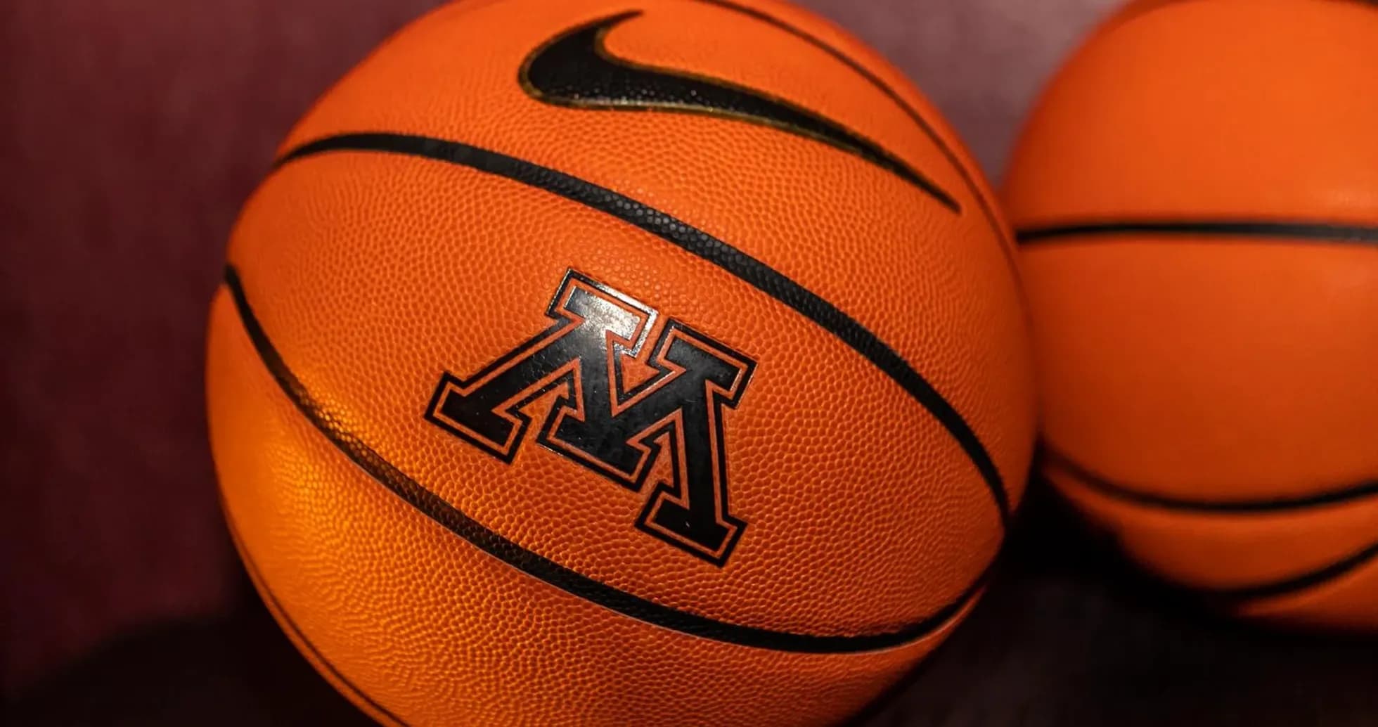 Two basketballs featuring the Minnesota logo Two basketballs featuring the Minnesota logo
